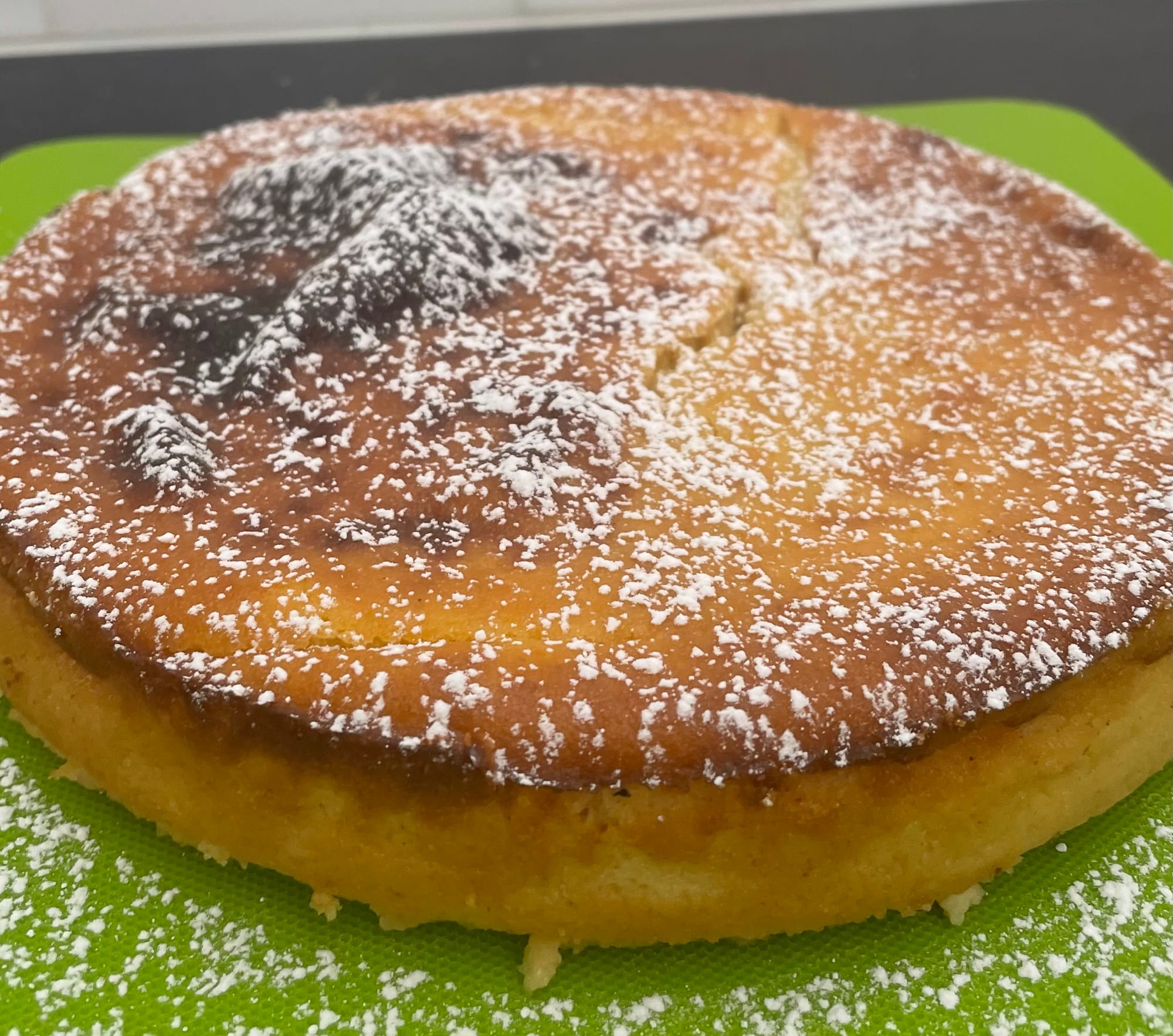 Cake on a cutting board.